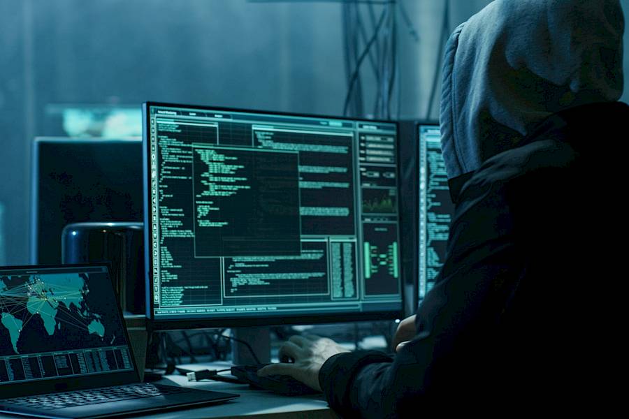 Cyber crimina using a laptop