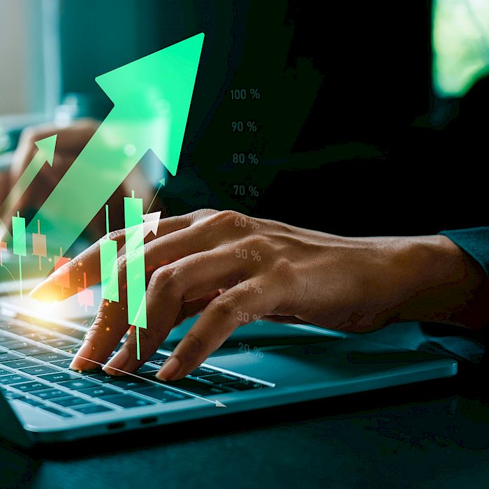 laptop with arrows siympolising information flowing in and out